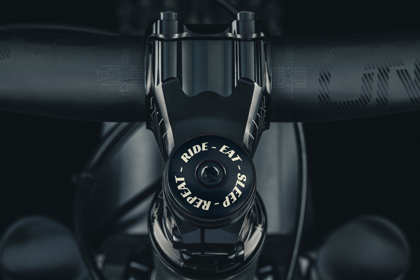 CBO Ride-Eat-Sleep-Repeat Stem Cap - Black